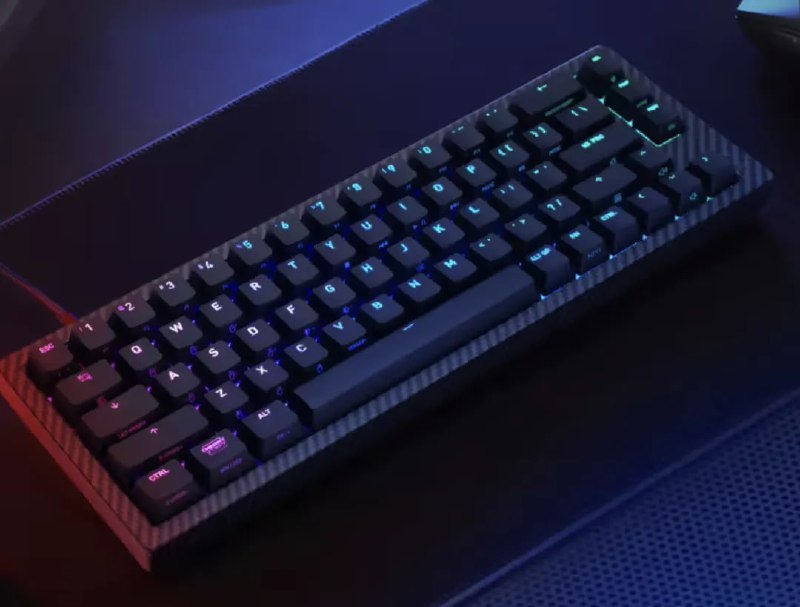 Cheery 推出碳纤维版 XTRFY K5 PRO TMRCherry 近日为自家的磁轴游戏键盘「XTRFY K5 PRO TMR」推出了全新的碳纤维版本，该版本将内部定位版替换为碳纤维材质，并在键盘上盖使用了碳纤维纹理涂装